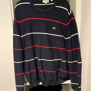 Lacoste Men's Crewneck Sweater in Navy with Red and White Stripes. 100% cotton
